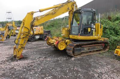 image showing a large yellow on-track machine
