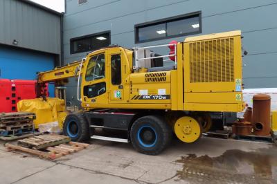 image showing a large yellow on-track machine