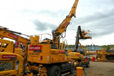 image showing a large yellow on-track machine