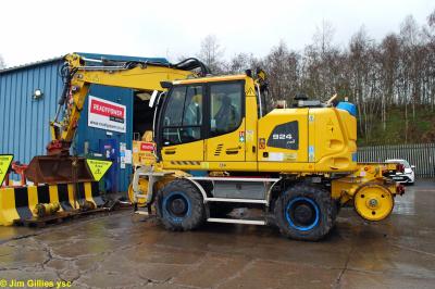 image showing a large yellow on-track machine