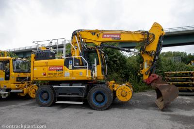 image showing a large yellow on-track machine