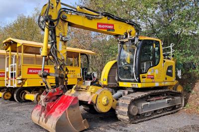 image showing a large yellow on-track machine
