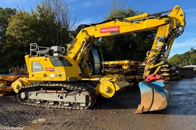 image showing a large yellow on-track machine