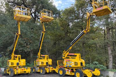 image showing a large yellow on-track machine