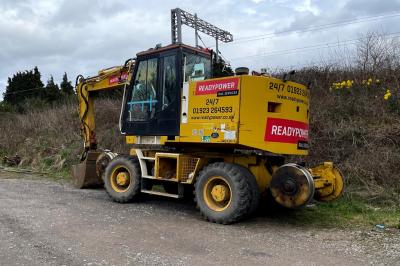 image showing a large yellow on-track machine