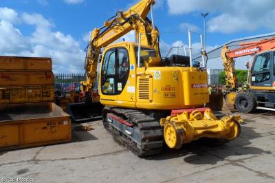 image showing a large yellow on-track machine