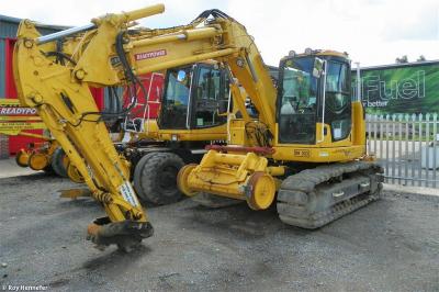 image showing a large yellow on-track machine