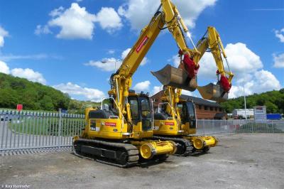 image showing a large yellow on-track machine
