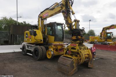 image showing a large yellow on-track machine