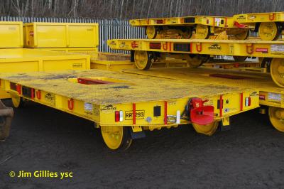 image showing a large yellow on-track machine