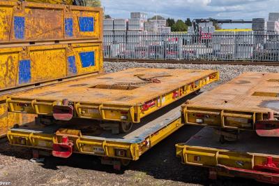 image showing a large yellow on-track machine