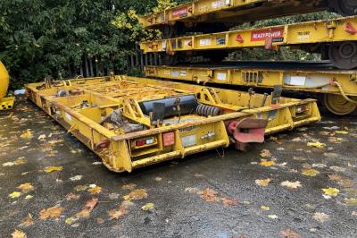 image showing a large yellow on-track machine