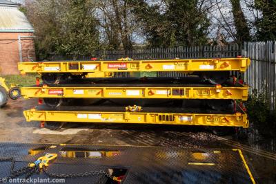 image showing a large yellow on-track machine