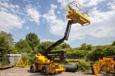 image showing a large yellow on-track machine