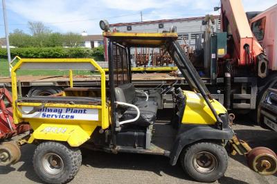 image showing a large yellow on-track machine