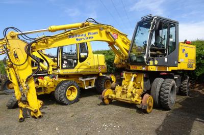 image showing a large yellow on-track machine