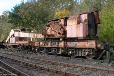image showing a large yellow on-track machine