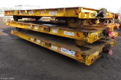 image showing a large yellow on-track machine