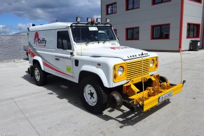 image showing a large yellow on-track machine