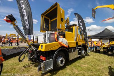 image showing a large yellow on-track machine