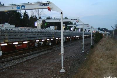 image showing a large yellow on-track machine