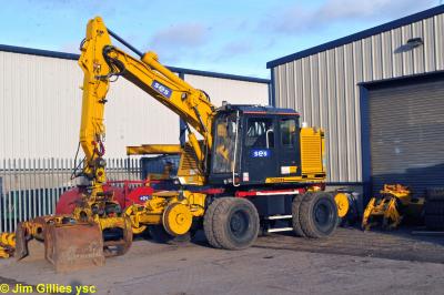 image showing a large yellow on-track machine