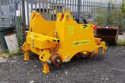 image showing a large yellow on-track machine