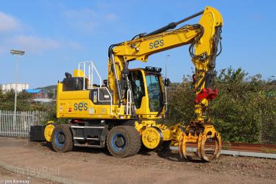 image showing a large yellow on-track machine