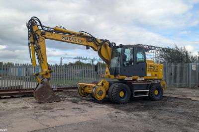 image showing a large yellow on-track machine