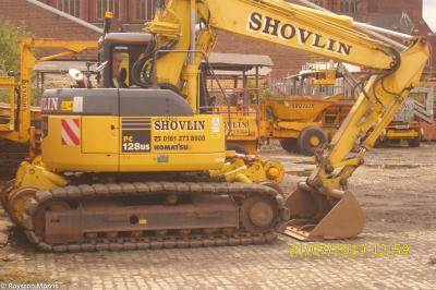 image showing a large yellow on-track machine
