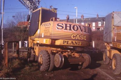 image showing a large yellow on-track machine
