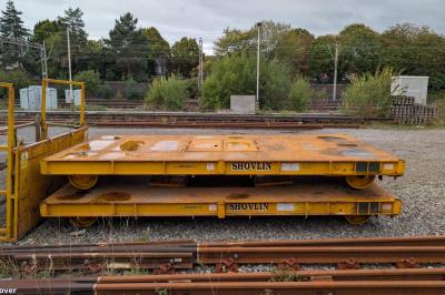 image showing a large yellow on-track machine
