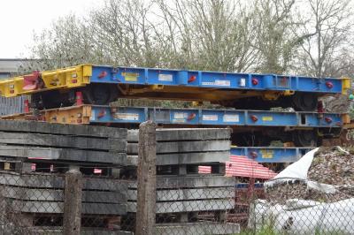 image showing a large yellow on-track machine