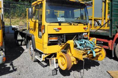 image showing a large yellow on-track machine