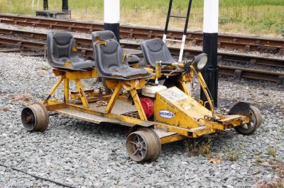 image showing a large yellow on-track machine