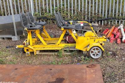 image showing a large yellow on-track machine