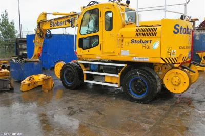 image showing a large yellow on-track machine