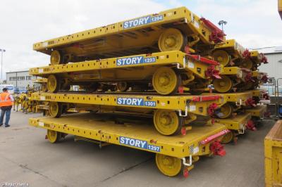 image showing a large yellow on-track machine