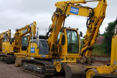 image showing a large yellow on-track machine
