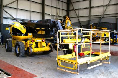 image showing a large yellow on-track machine