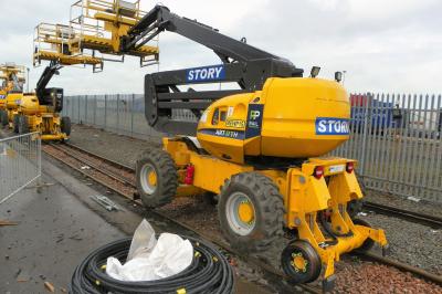 image showing a large yellow on-track machine