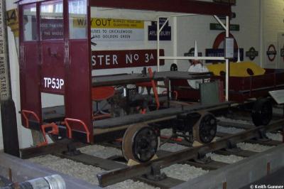 image showing a large yellow on-track machine