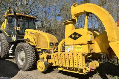 image showing a large yellow on-track machine