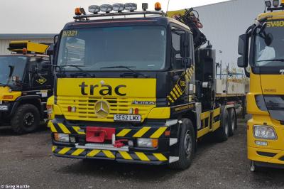 image showing a large yellow on-track machine