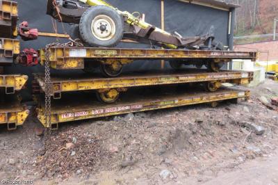 image showing a large yellow on-track machine