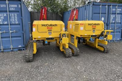 image showing a large yellow on-track machine