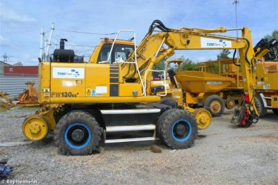 image showing a large yellow on-track machine