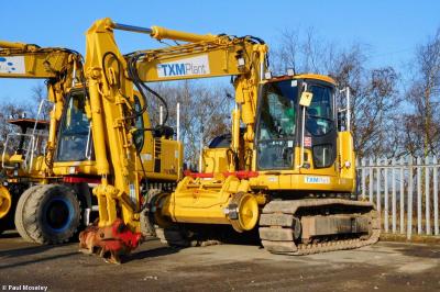 image showing a large yellow on-track machine