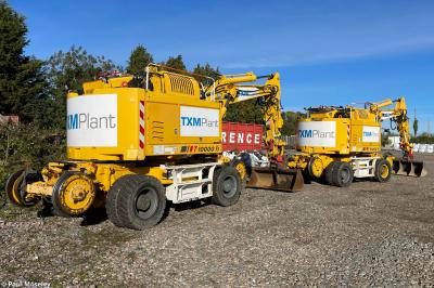 image showing a large yellow on-track machine