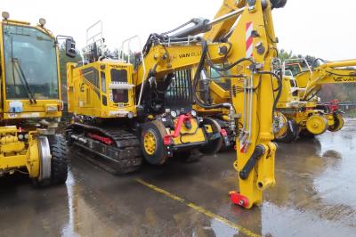 image showing a large yellow on-track machine